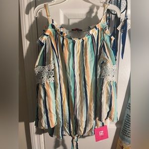 Very pretty multi colored girls blouse with flare sleeves.